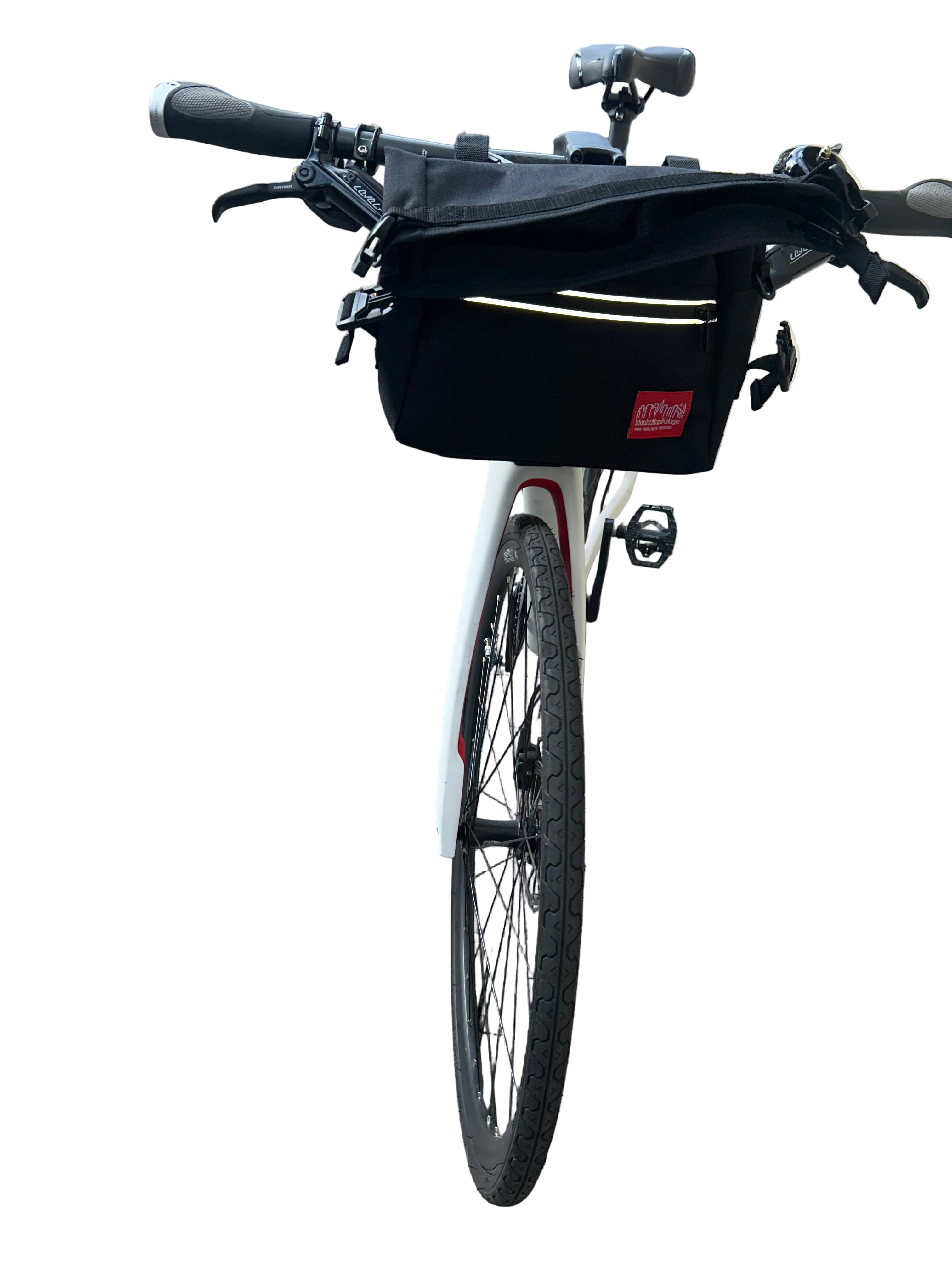 Bicycle with a black bag on a paved sidewalk