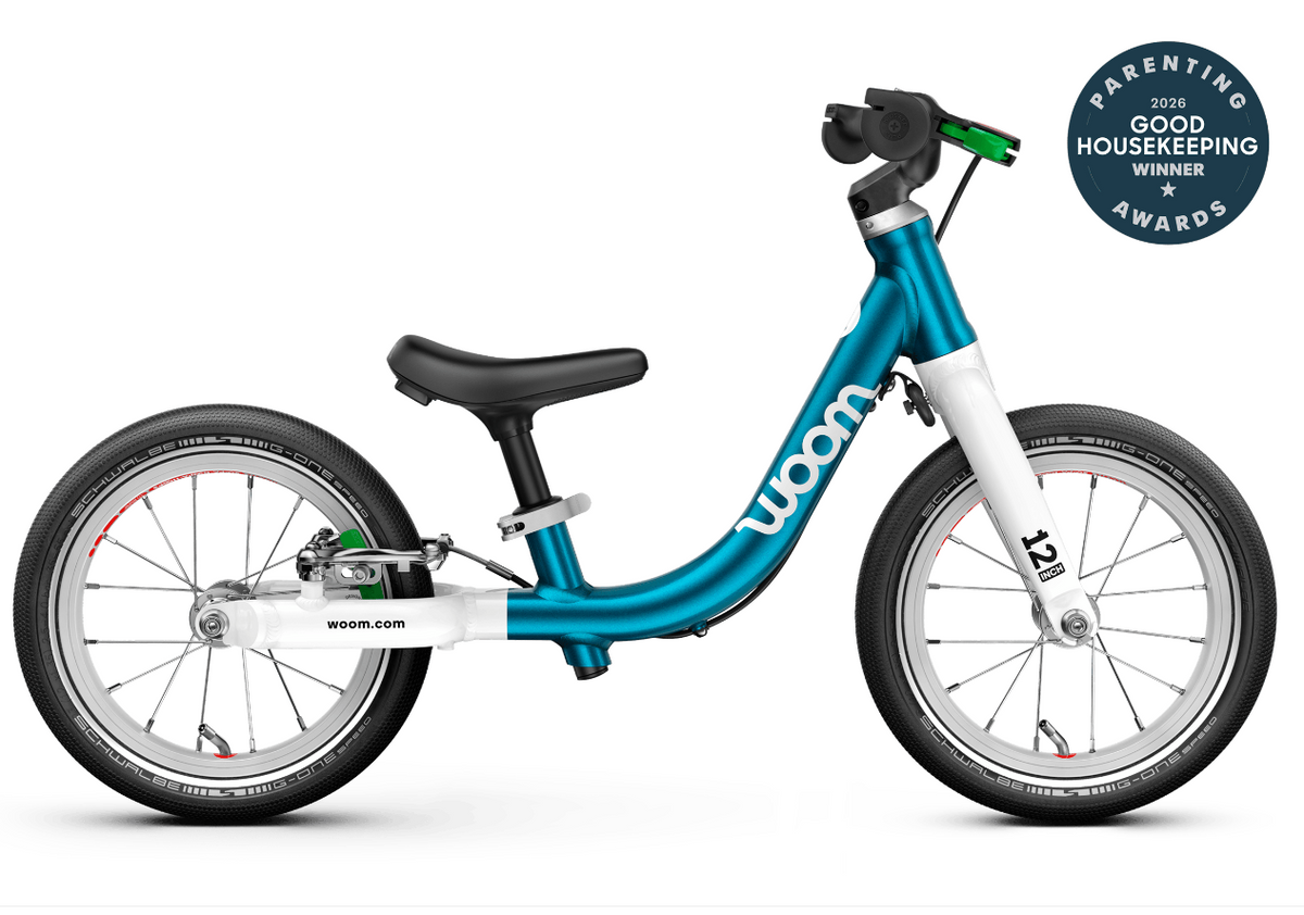 Side view of woom GO 1 balance bike for ages 18 months to 3.5 years