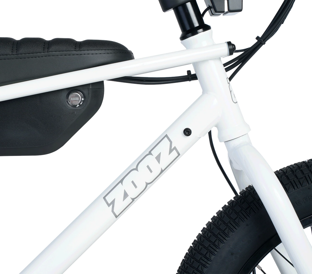 Close-up of a white bicycle with 'Zoop' branding on a white background