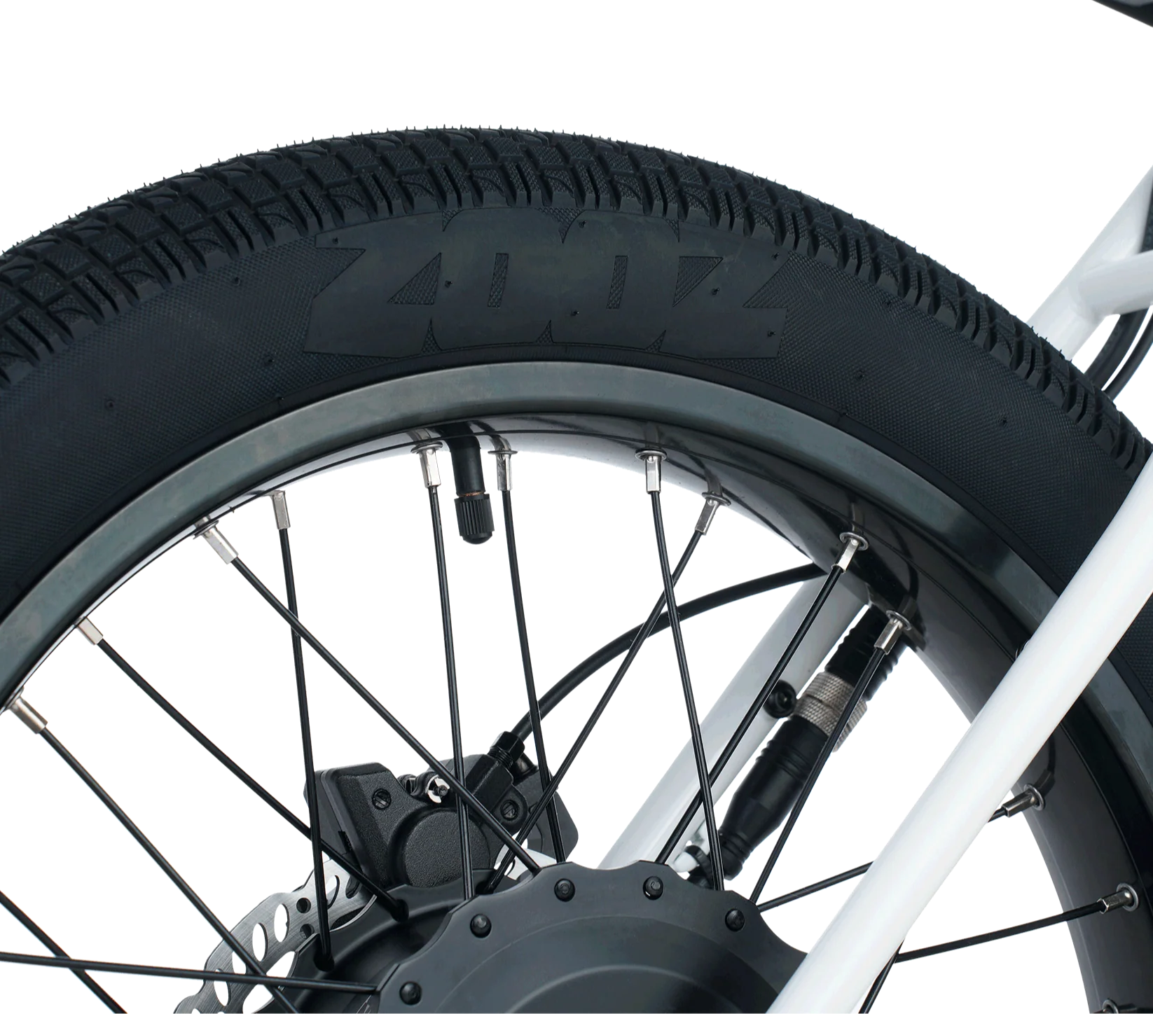 Close-up of a bicycle wheel with tire and suspension fork on a white background