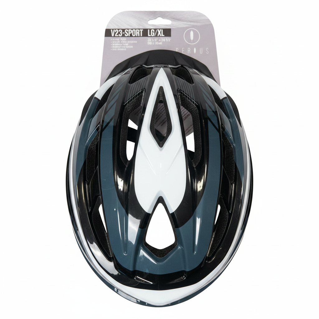 A black, white, and dark teal bicycle helmet in its original retail packaging, displayed flat on a light brown wooden floor. The packaging header card is visible at the top.