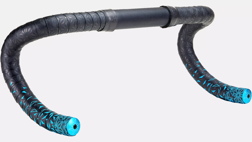 Black and blue bicycle handlebar with floral pattern on a white background