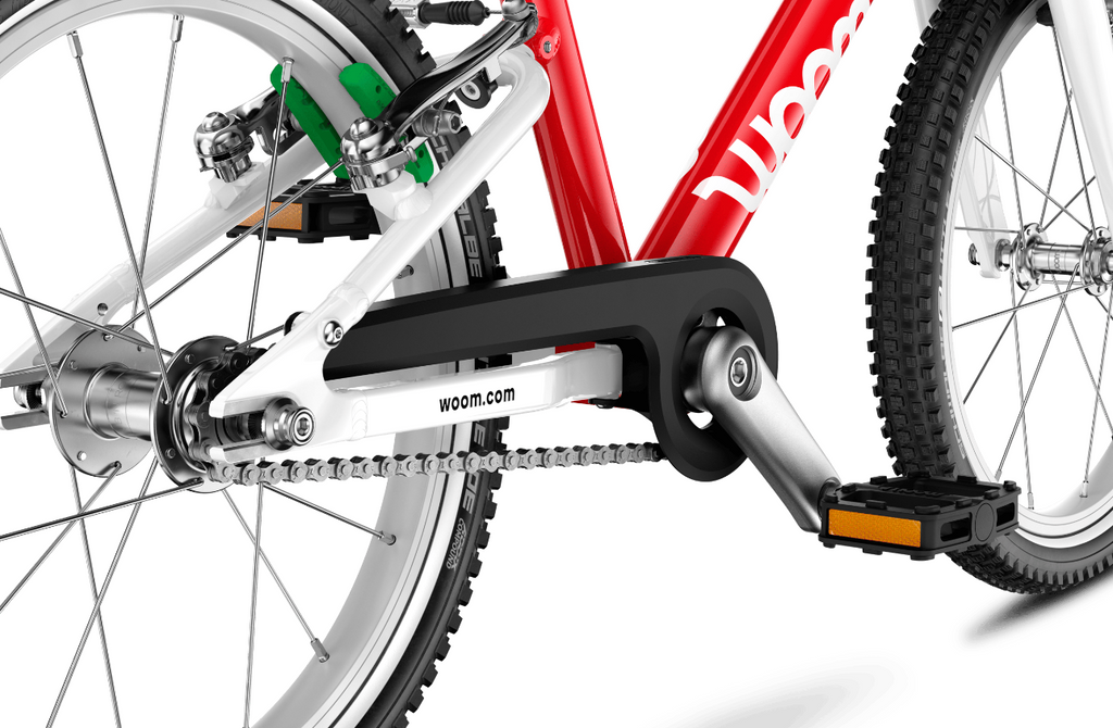 woom GO 3 lightweight crankset pedals and protective chainguard